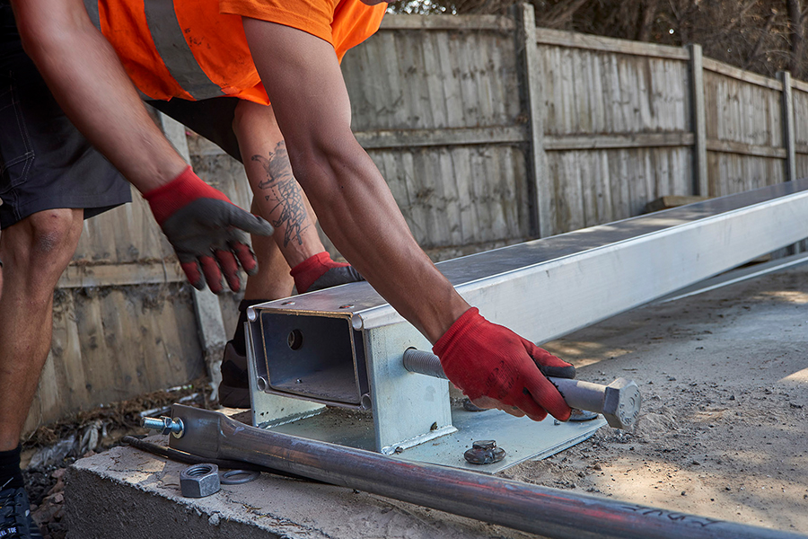 Warehouse Build Leg being attached to baseplate