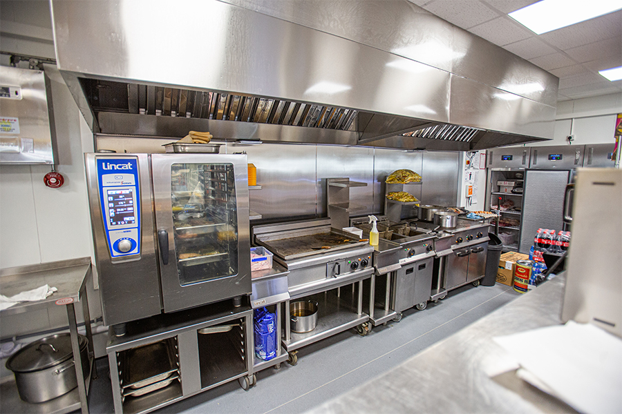 Construction site canteen temporary structure with Kitchen space installed through gable side